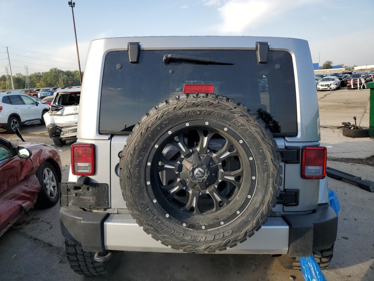 2014 Jeep Wrangler Unlimited Sahara VIN: 1C4BJWEG6EL132300 Lot: 74027394