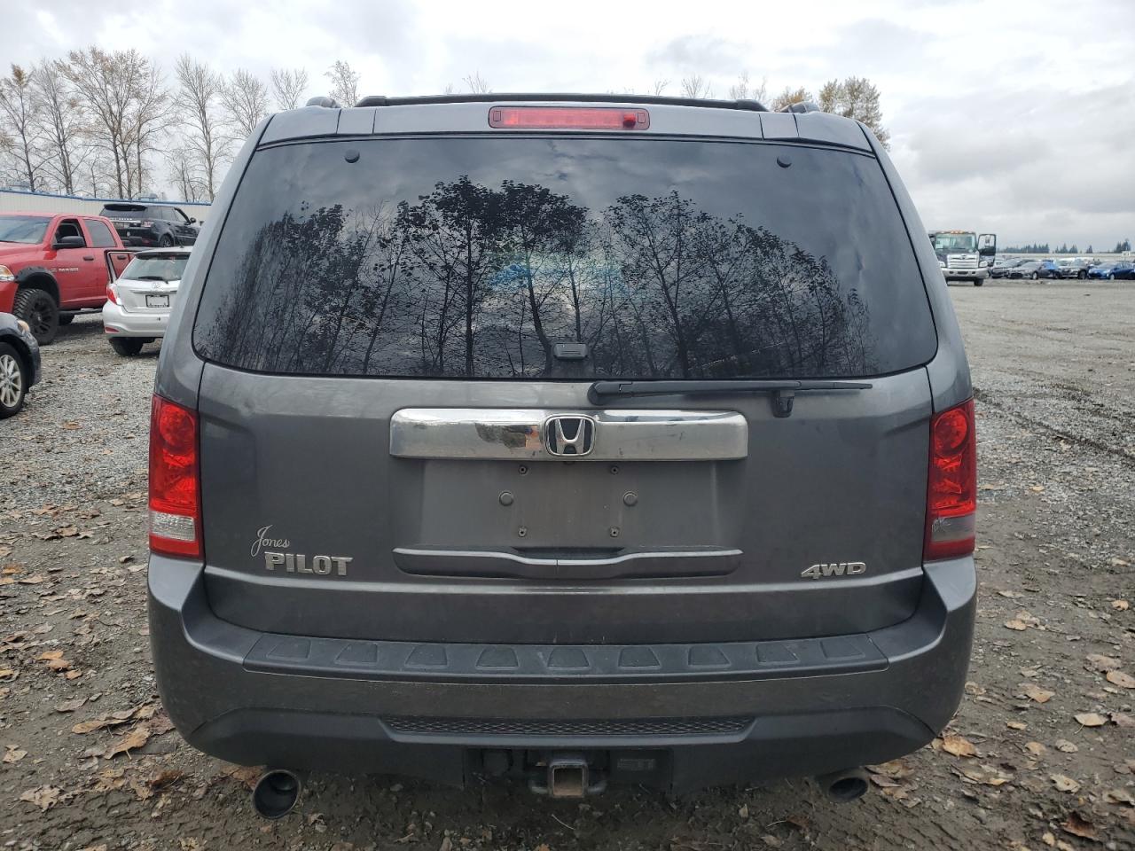 2012 Honda Pilot Exl VIN: 5FNYF4H6XCB040996 Lot: 77778894