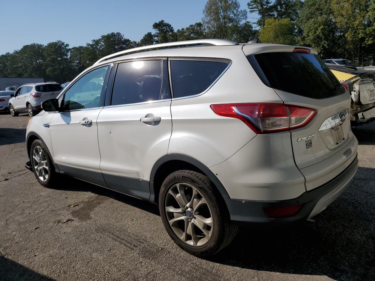 2016 Ford Escape Titanium VIN: 1FMCU0JX3GUB11296 Lot: 74769394