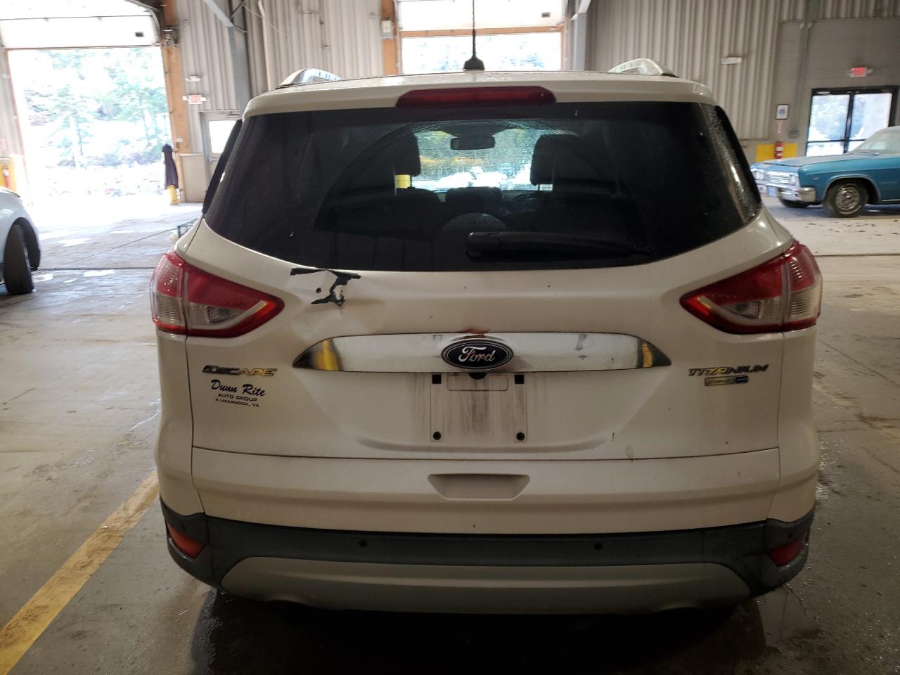 2016 Ford Escape Titanium VIN: 1FMCU9J93GUA41627 Lot: 76976194