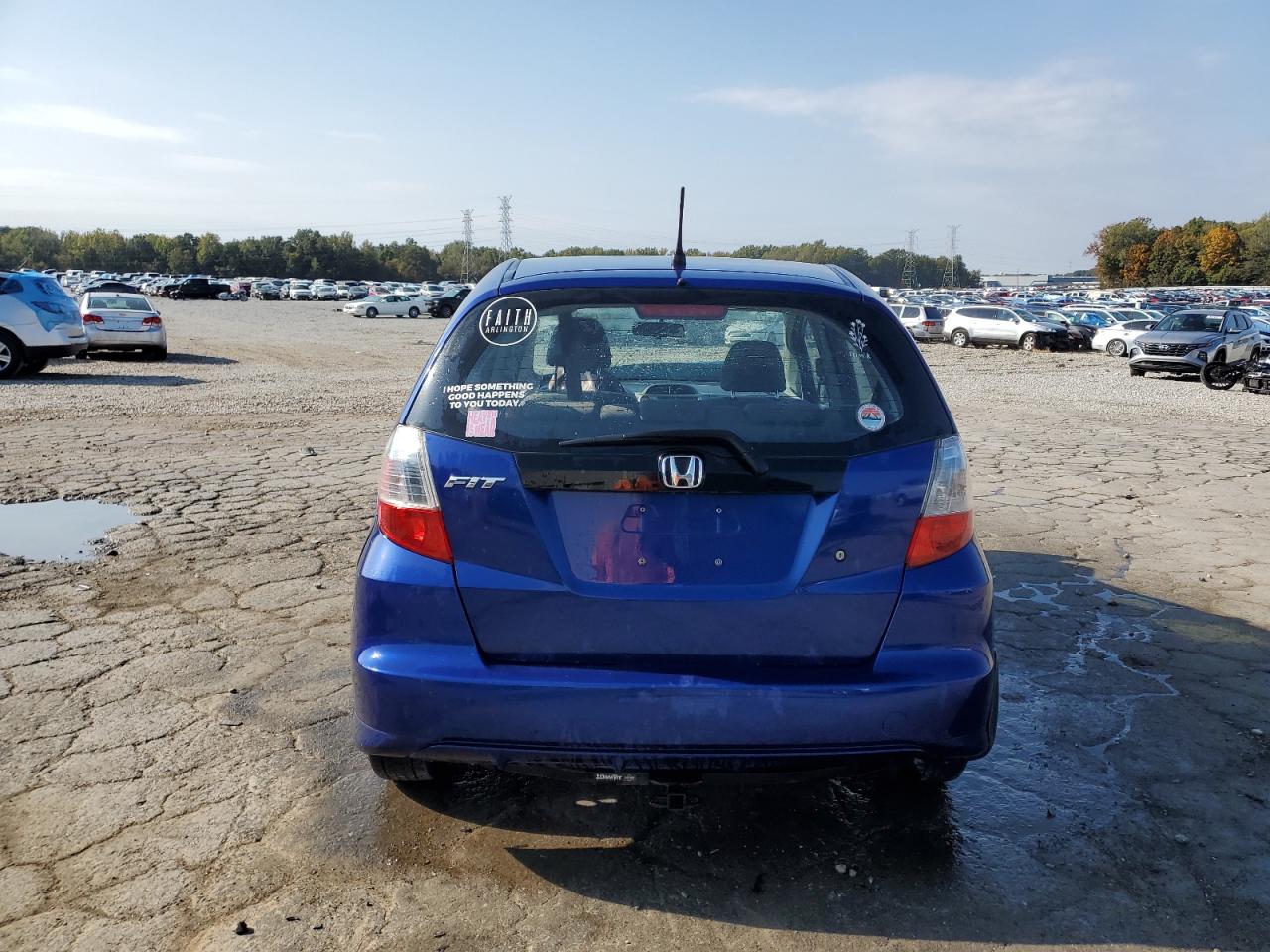 2009 Honda Fit VIN: JHMGE88229C000659 Lot: 77795354