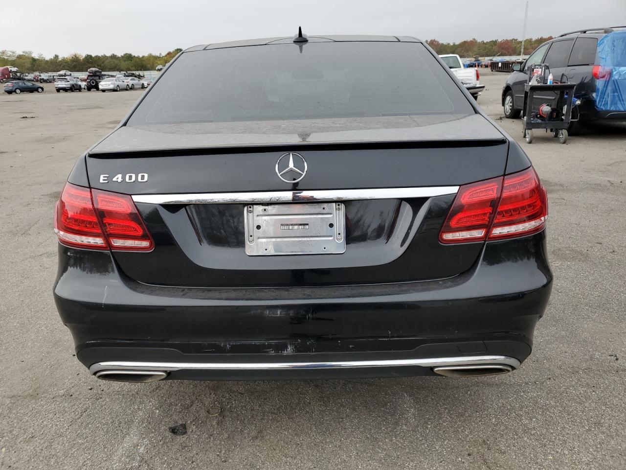 2014 Mercedes-Benz E 400 Hybrid VIN: WDDHF9FB4EA909283 Lot: 73703584