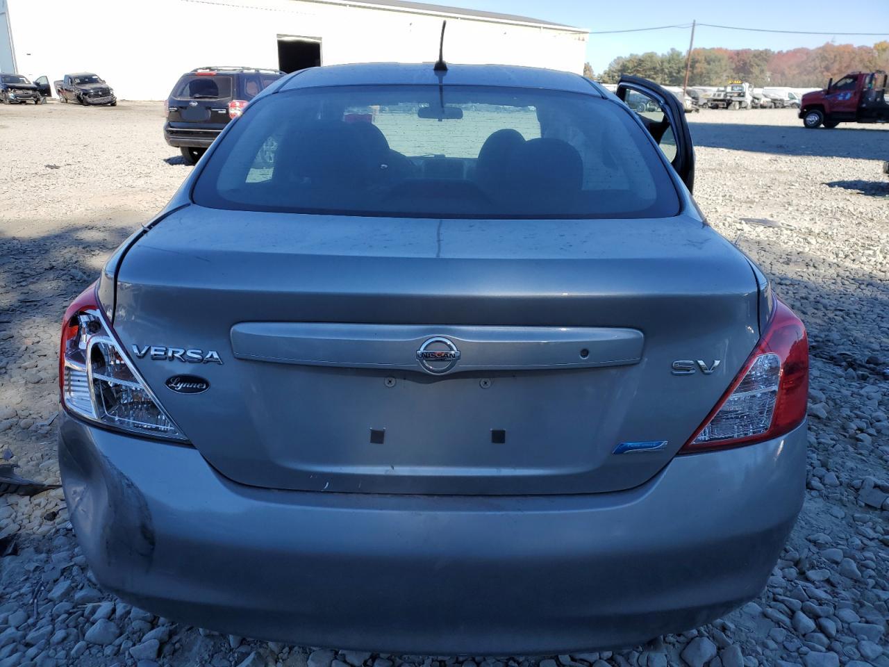 2012 Nissan Versa S VIN: 3N1CN7AP4CL830767 Lot: 77544794