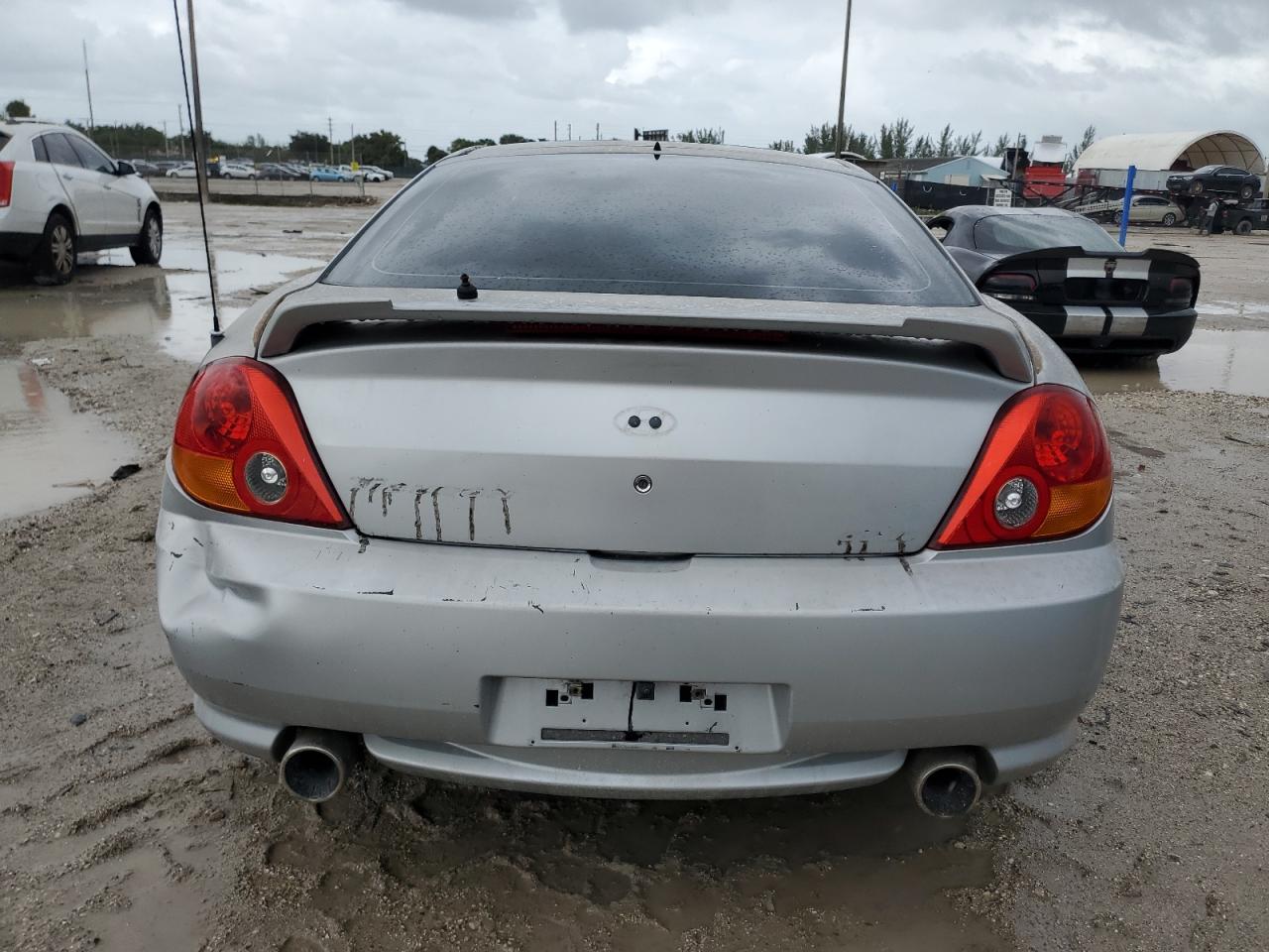 2003 Hyundai Tiburon Gt VIN: KMHHN65F23U084299 Lot: 75105394