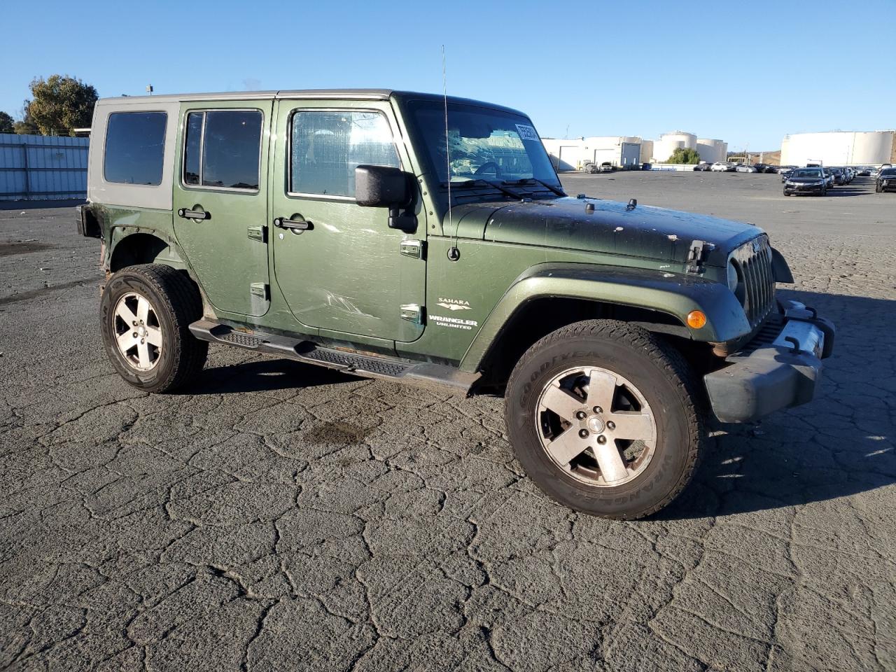 2009 Jeep Wrangler Unlimited Sahara VIN: 1J4GA59159L710764 Lot: 75525834