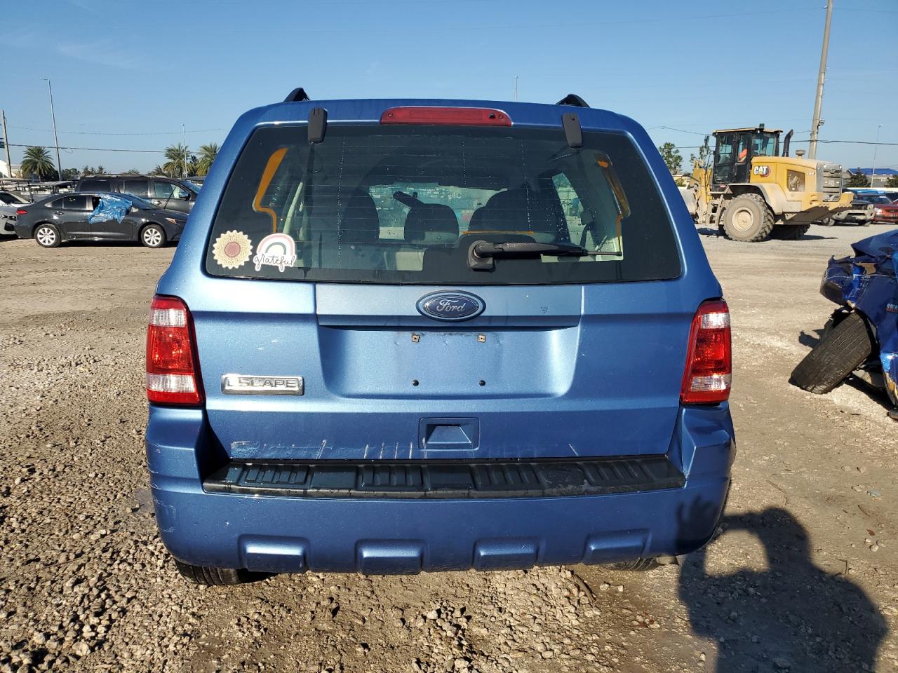 2010 Ford Escape Xls VIN: 1FMCU0C70AKC63617 Lot: 77876284