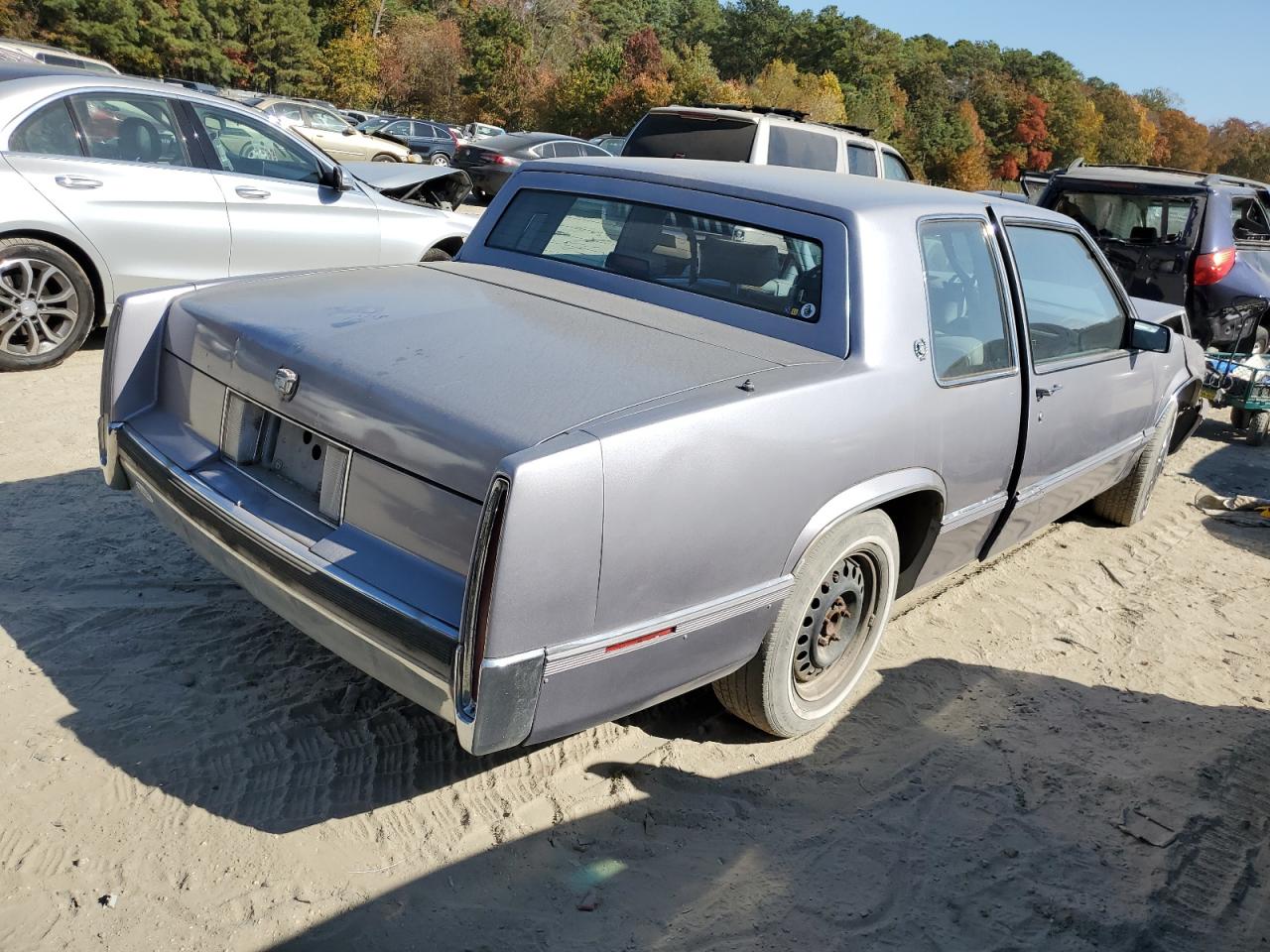 1990 Cadillac Deville VIN: 1G6CD1339L4358825 Lot: 76901884