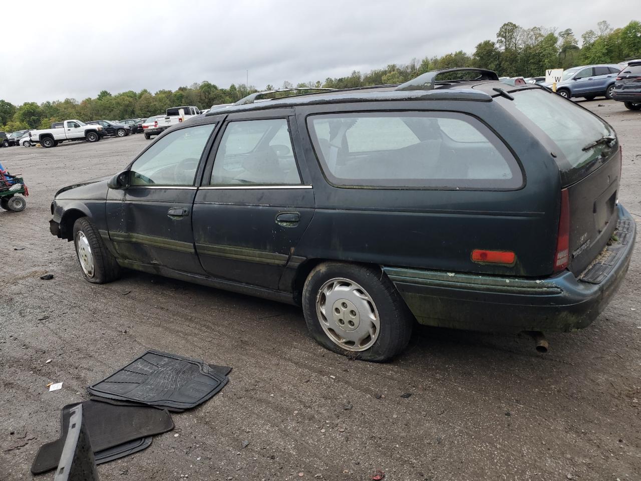 1995 Ford Taurus Gl VIN: 1FALP57U7SA210516 Lot: 73996664