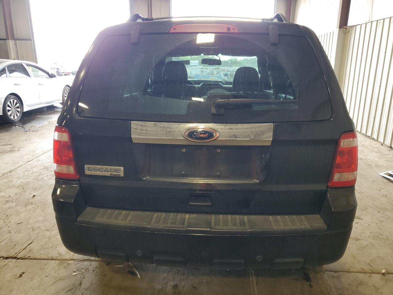 2010 Ford Escape Limited VIN: 1FMCU9E72AKD24385 Lot: 74980074