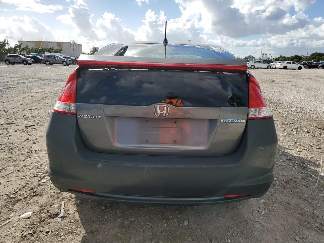 2010 Honda Insight Ex VIN: JHMZE2H72AS034385 Lot: 76396414