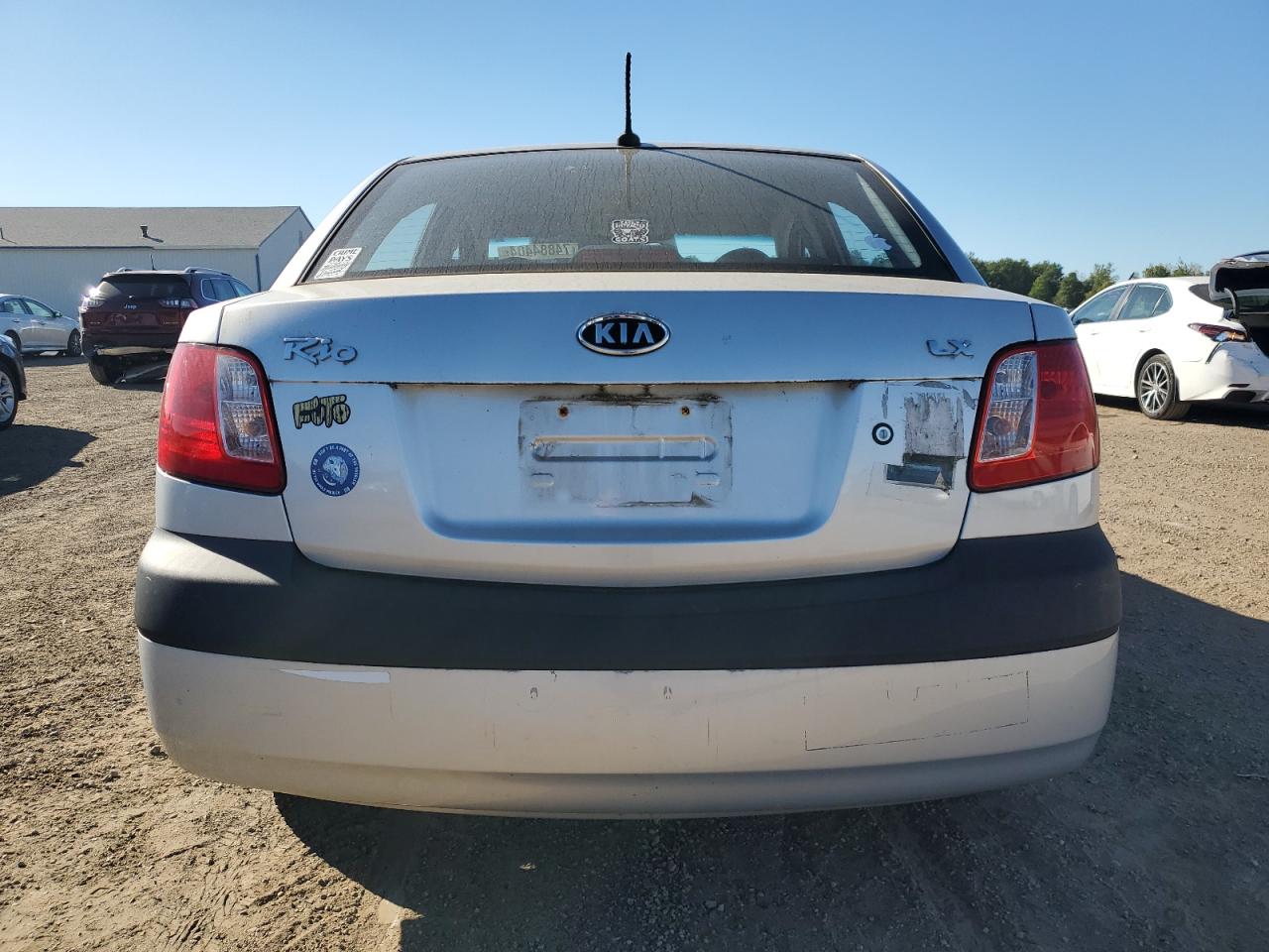 2009 Kia Rio Base VIN: KNADE223796504896 Lot: 74884404