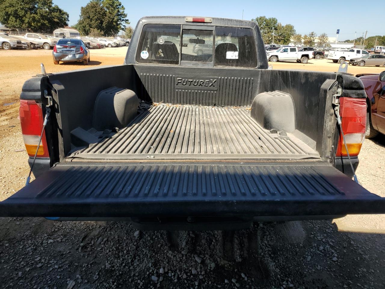 1995 Ford Ranger Super Cab VIN: 1FTCR14X2STA61772 Lot: 77033104