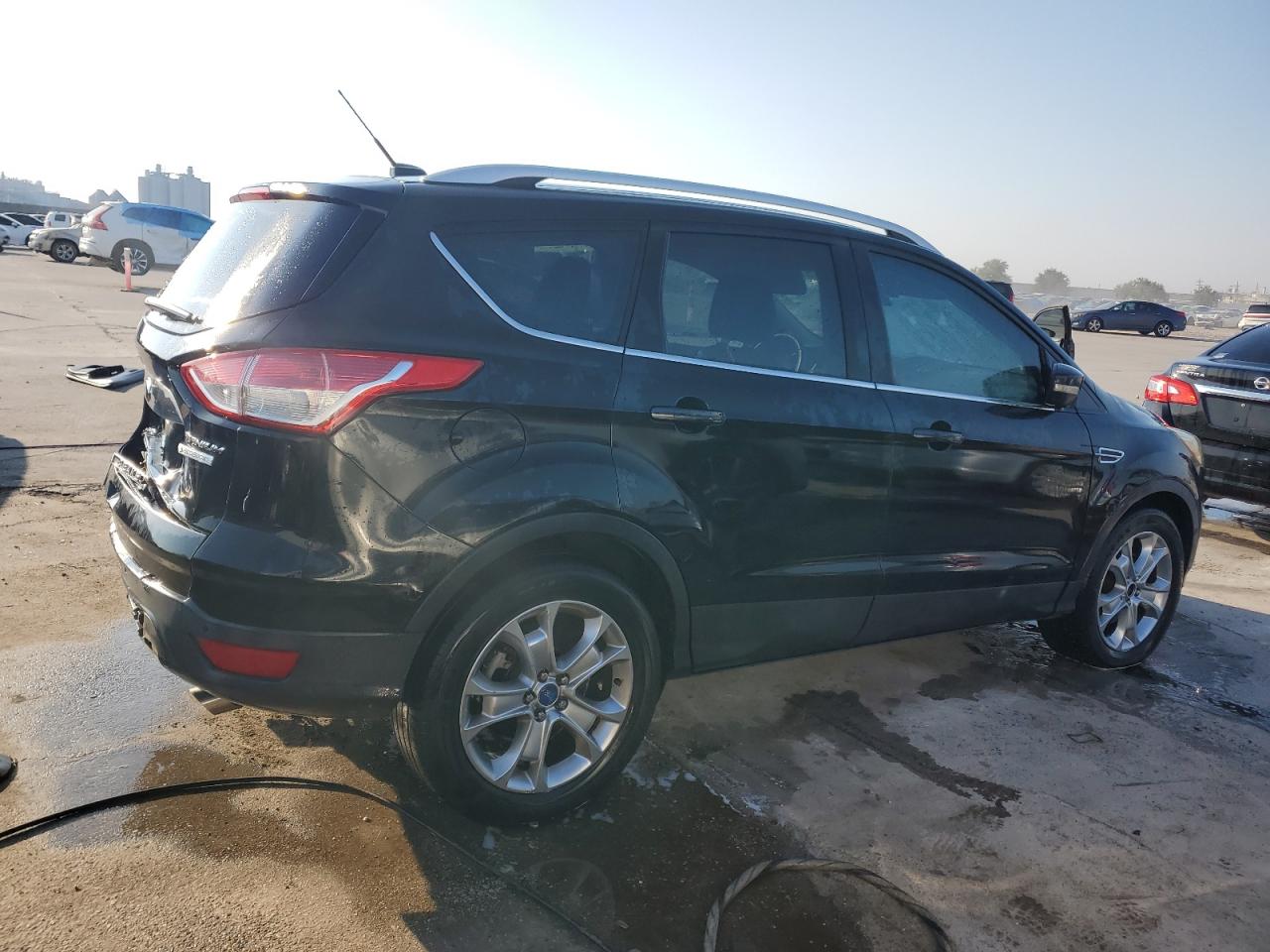 2014 Ford Escape Titanium VIN: 1FMCU0J90EUB12355 Lot: 75189124