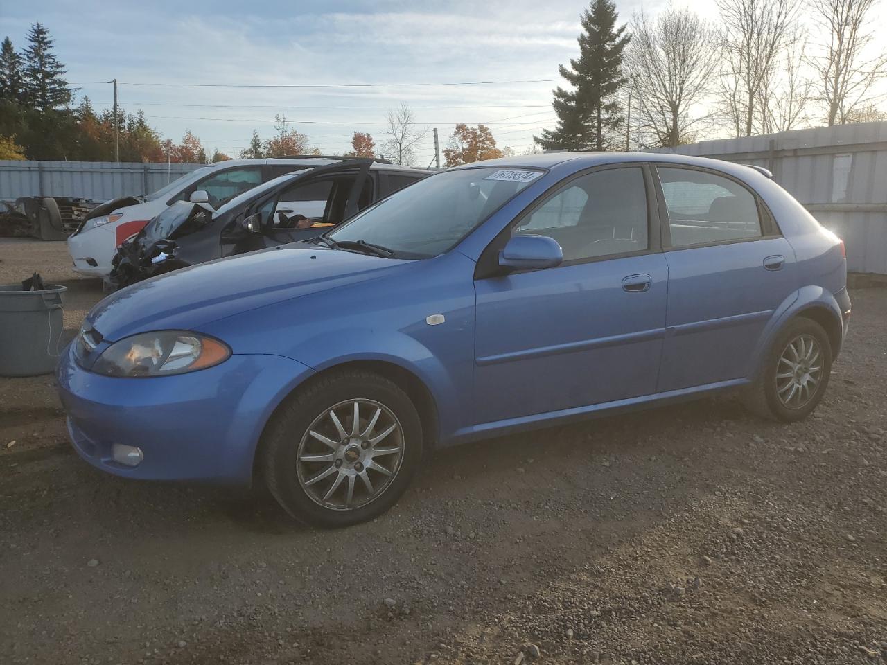 2005 Chevrolet Optra 5 Ls VIN: KL1JK69Z55K217355 Lot: 76715574