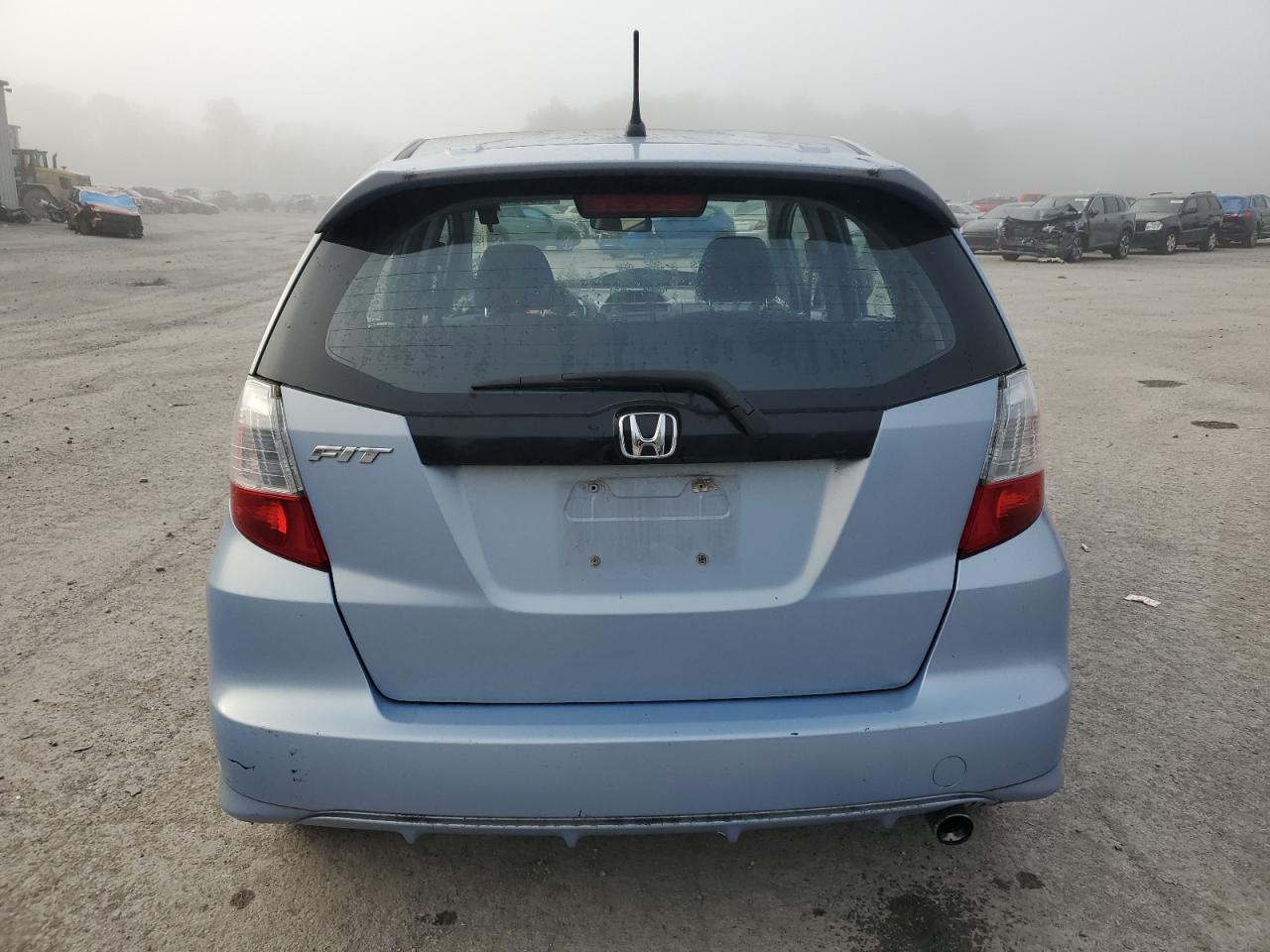 2009 Honda Fit Sport VIN: JHMGE88489S013228 Lot: 75806164