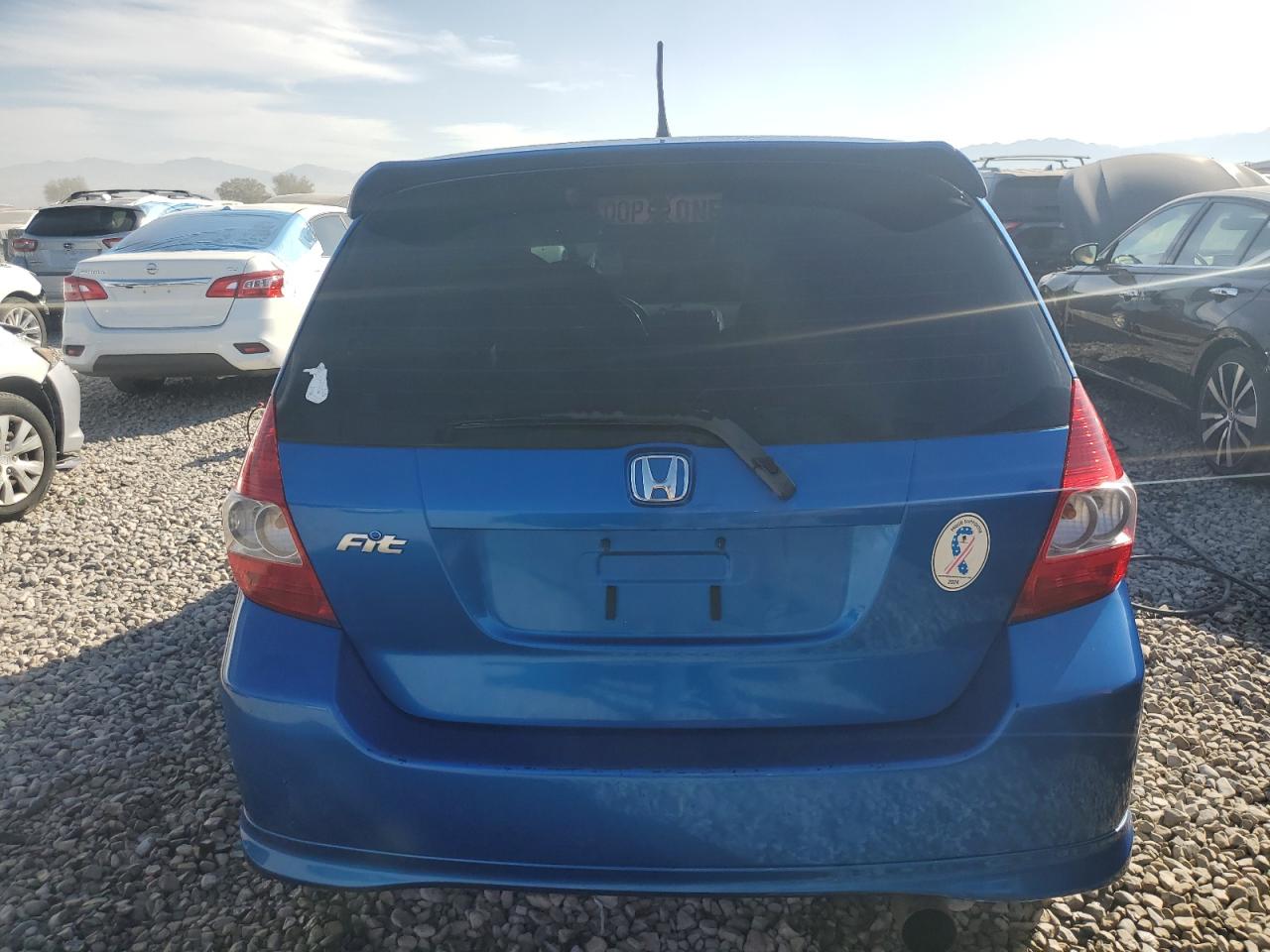 2007 Honda Fit S VIN: JHMGD37697S034711 Lot: 74599584