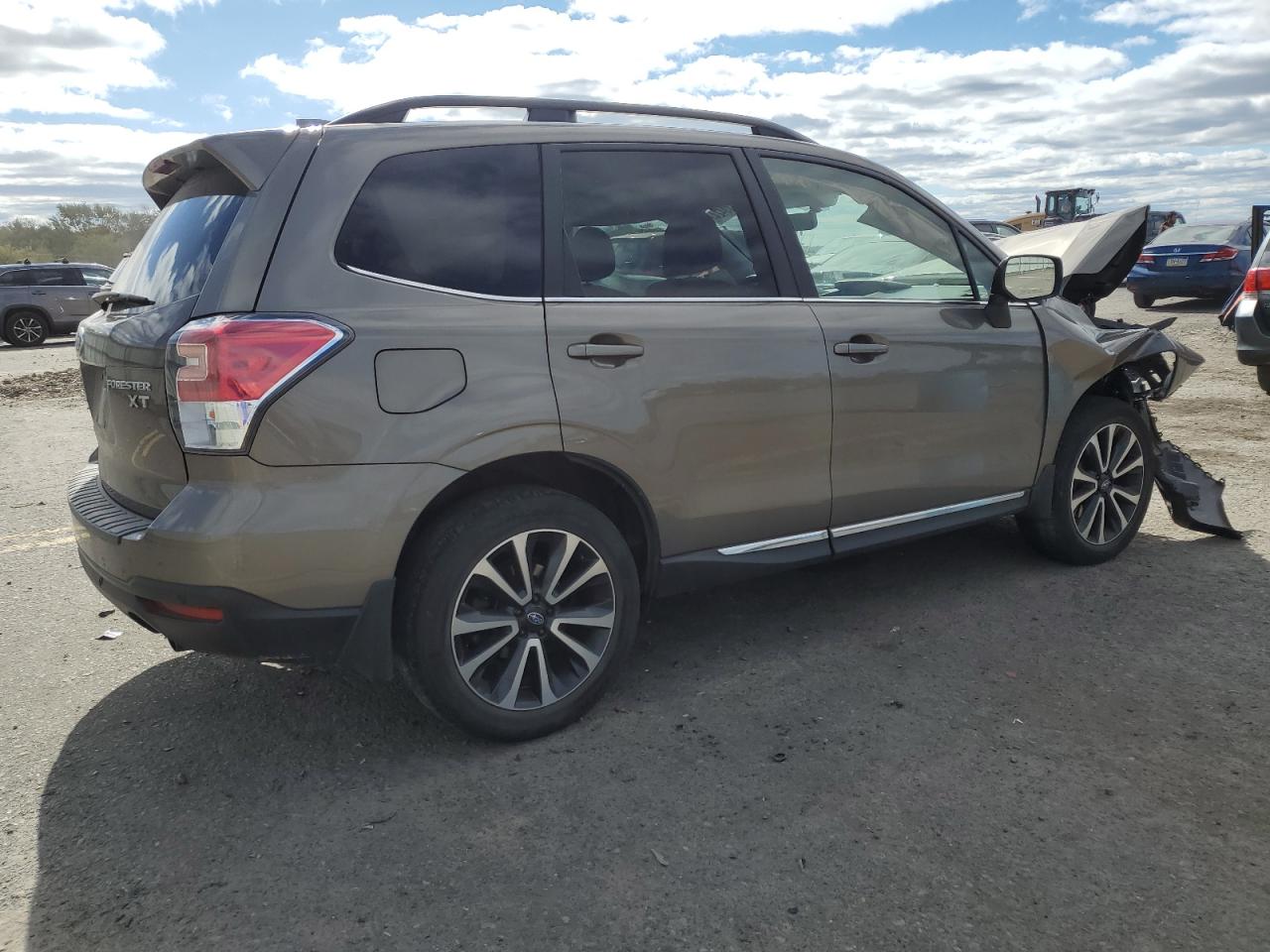 2018 Subaru Forester 2.0Xt Touring VIN: JF2SJGWC2JH440435 Lot: 76289424