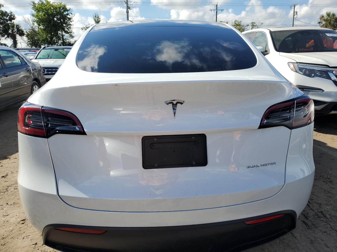 2023 Tesla Model Y VIN: 7SAYGAEE7PF780103 Lot: 74462244