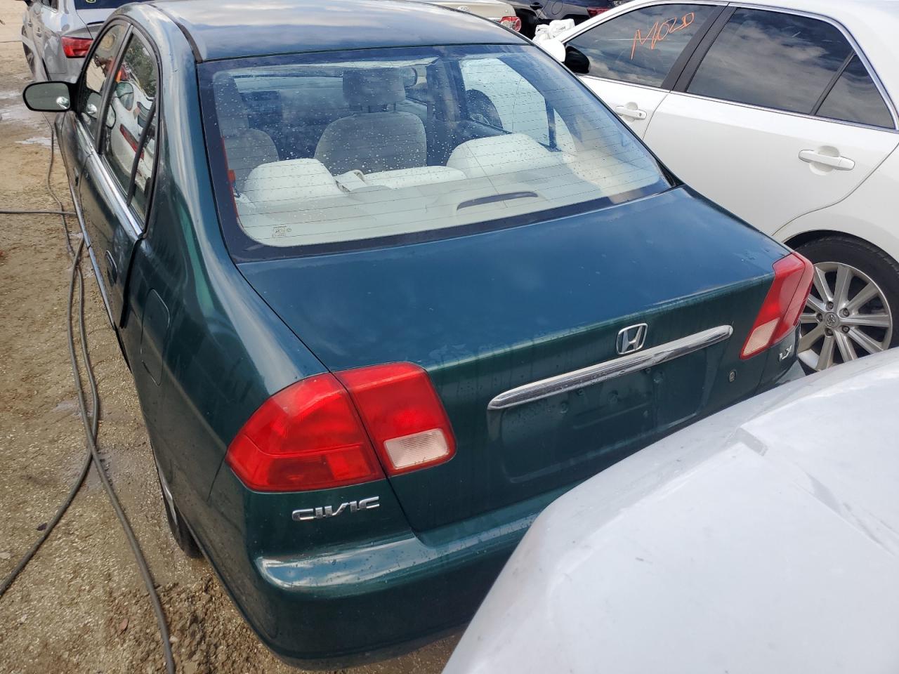 2002 Honda Civic Lx VIN: 1HGES165X2L029291 Lot: 74014624