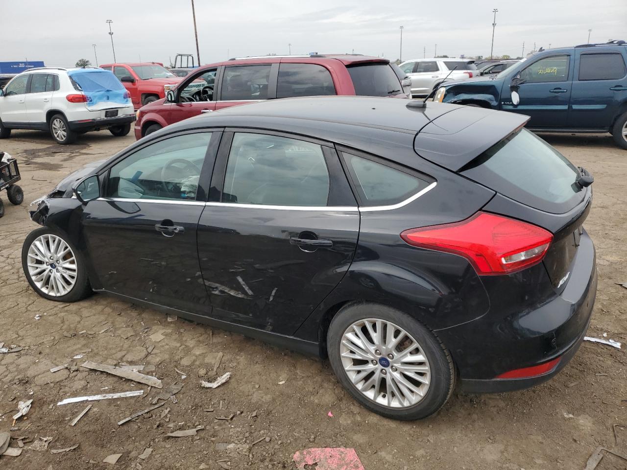 2016 Ford Focus Titanium VIN: 1FADP3N25GL383005 Lot: 73963354