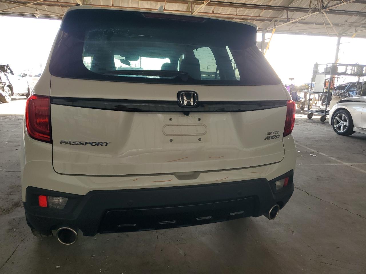 2023 Honda Passport Elite VIN: 5FNYF8H06PB032502 Lot: 75814814