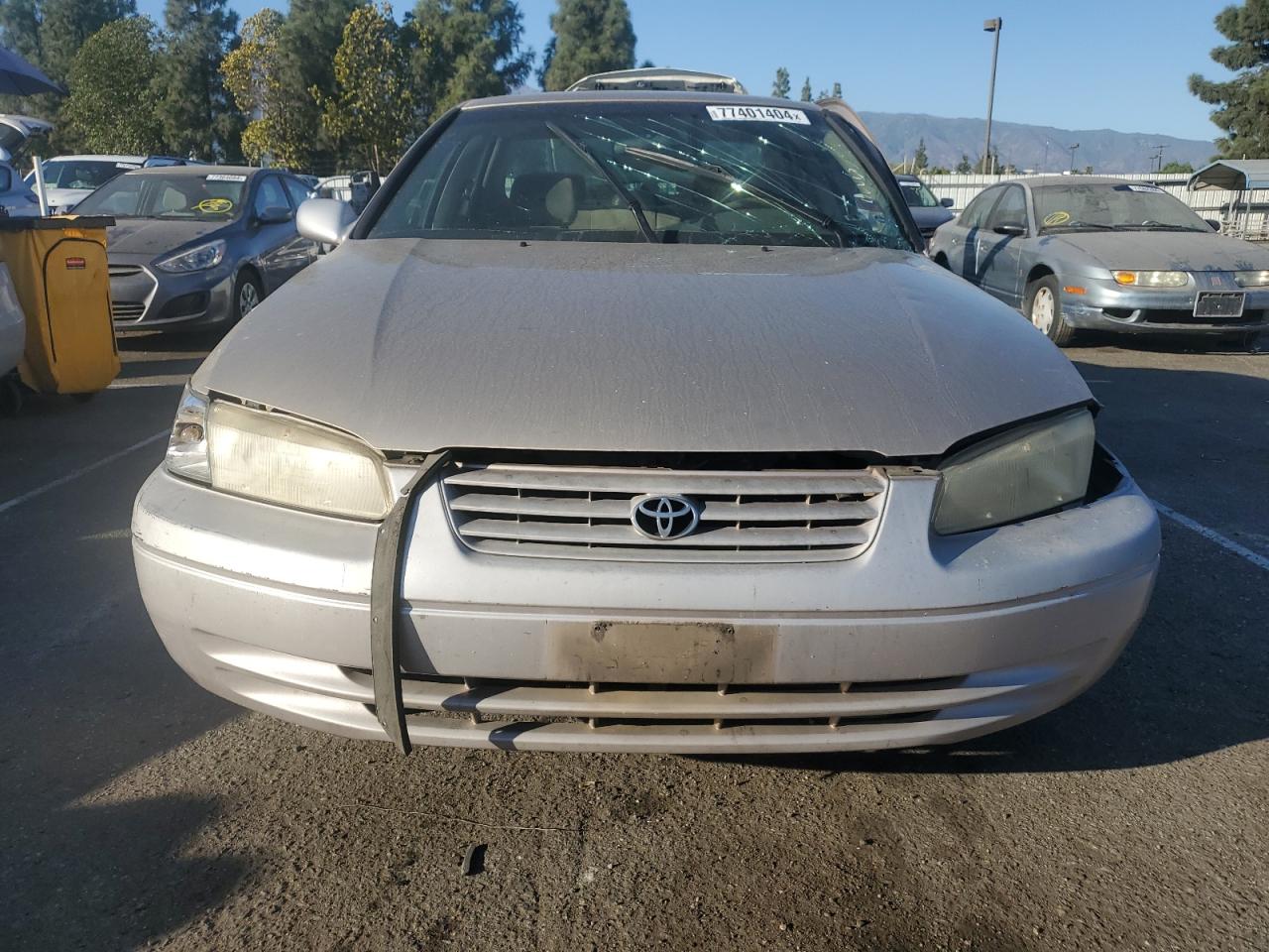 1999 Toyota Camry Le VIN: JT2BG22K9X0352057 Lot: 77401404