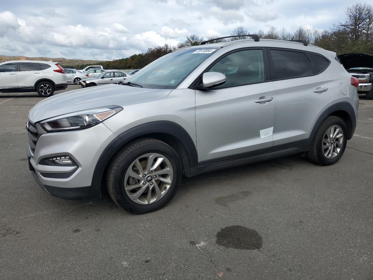 KM8J3CA23GU152379 2016 HYUNDAI TUCSON - Image 1