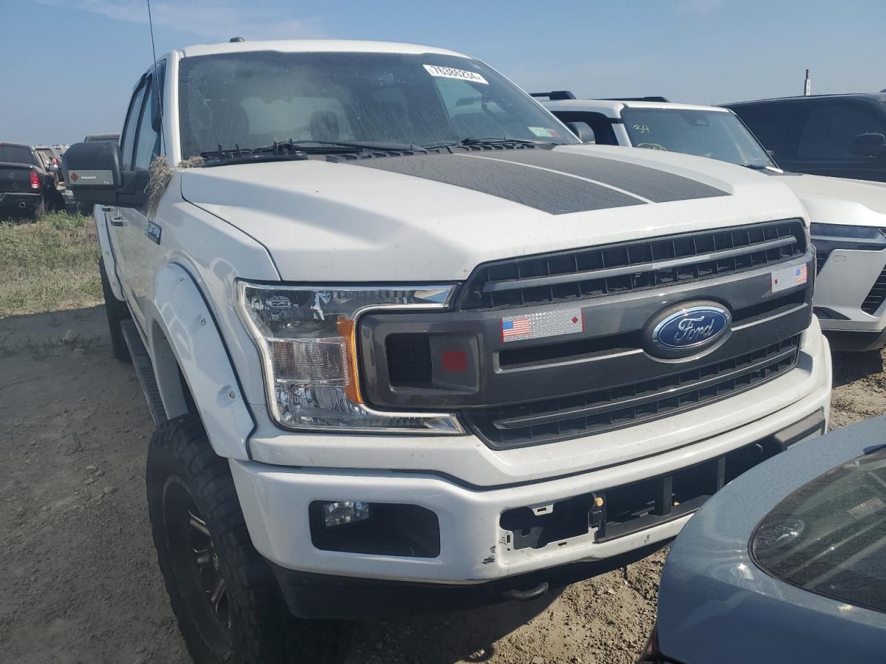 2018 Ford F150 Supercrew VIN: 1FTFW1EG5JFA82102 Lot: 76386234