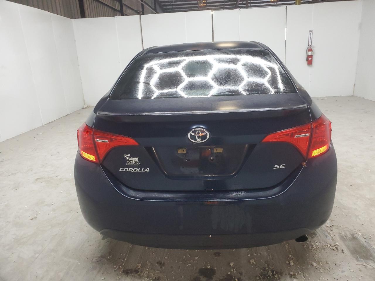 2017 Toyota Corolla L VIN: 5YFBURHEXHP596219 Lot: 75292764