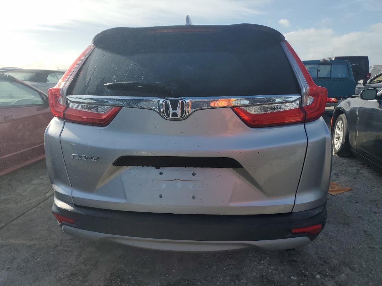 2019 Honda Cr-V Lx VIN: 2HKRW5H39KH408472 Lot: 75385174