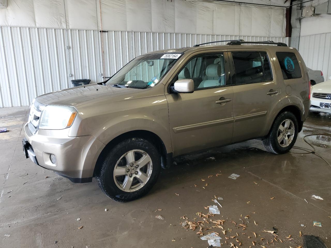 2011 Honda Pilot Exl VIN: 5FNYF4H54BB003450 Lot: 76062164