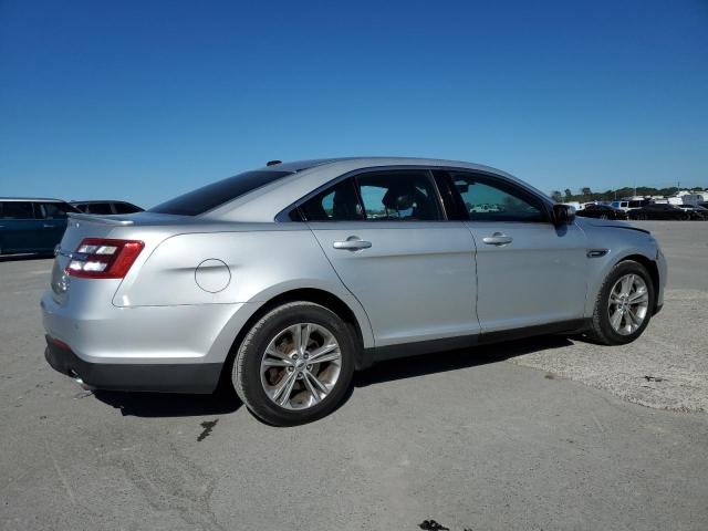 Седани FORD TAURUS 2013 Сріблястий