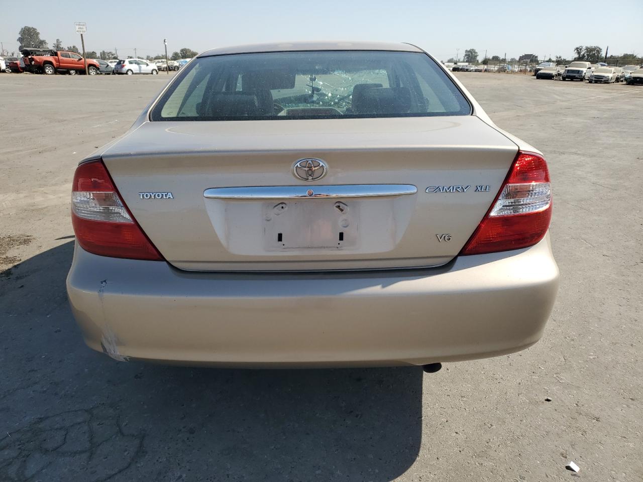 2002 Toyota Camry Le VIN: JTDBF30K520042497 Lot: 75248714