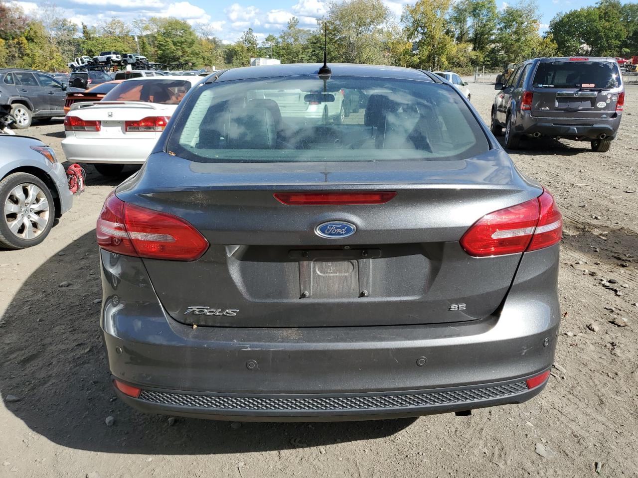 2016 Ford Focus Se VIN: 1FADP3F22GL354270 Lot: 75473504