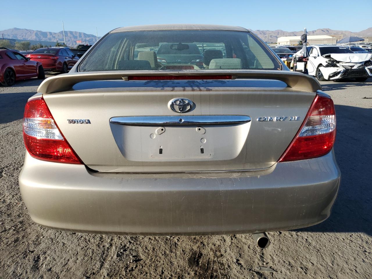 2003 Toyota Camry Le VIN: JTDBE30K430169584 Lot: 75470424