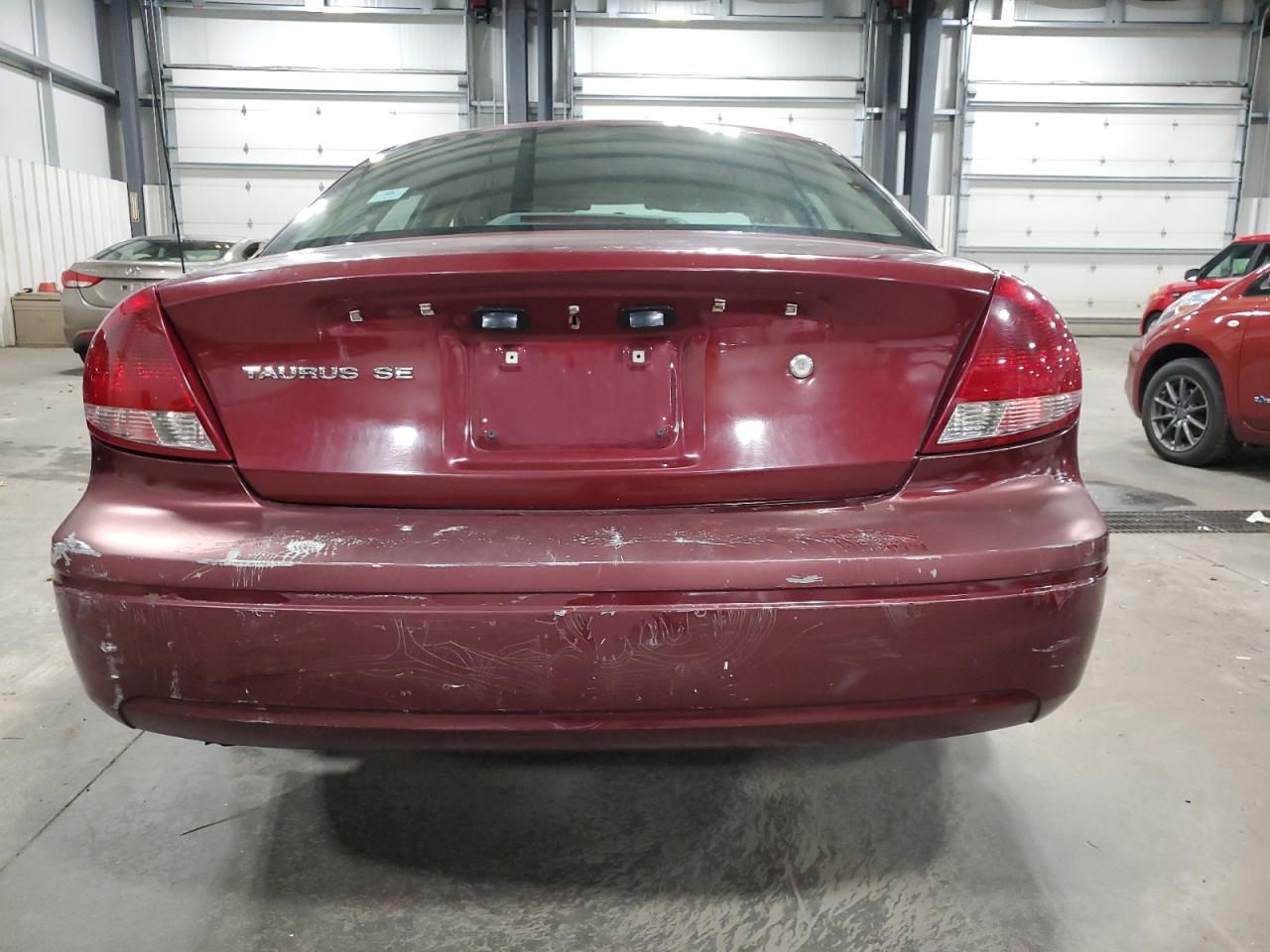 2007 Ford Taurus Se VIN: 1FAFP53U97A185709 Lot: 77897014