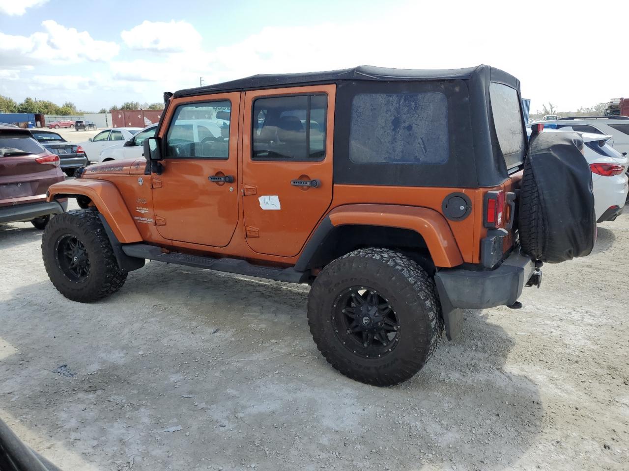 2011 Jeep Wrangler Unlimited Sahara VIN: 1J4BA5H10BL618334 Lot: 78225944