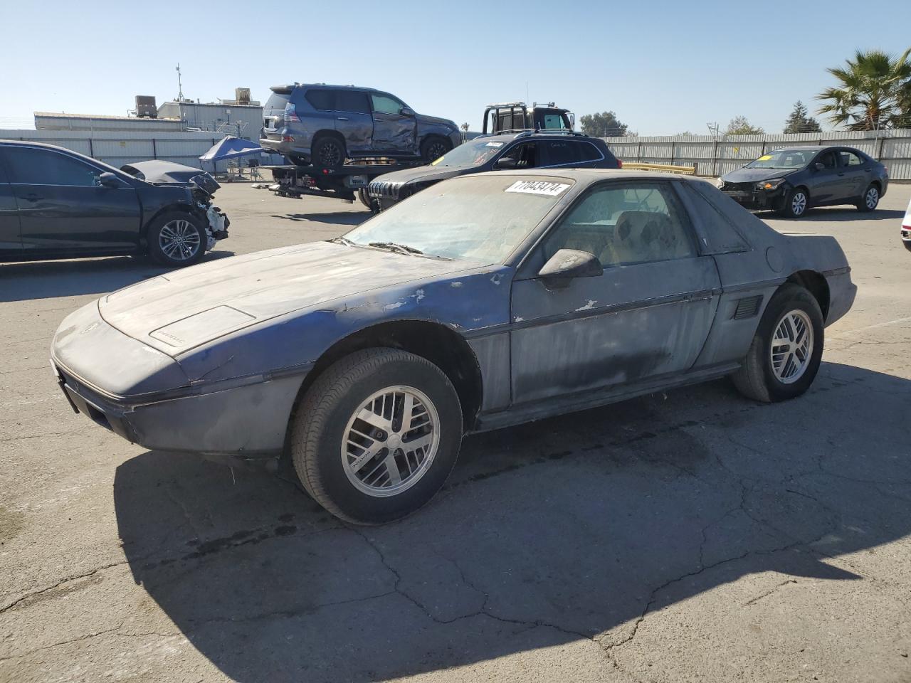 1986 Pontiac Fiero Sport VIN: 1G2PM37R2FP239143 Lot: 77043474