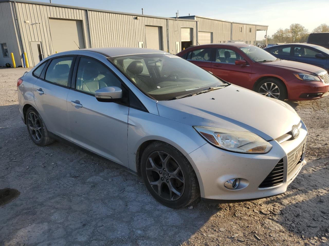 VIN 1FADP3F22DL314203 2013 FORD FOCUS no.4