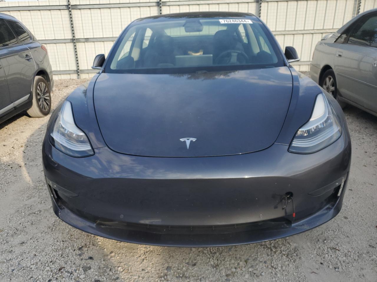 2018 Tesla Model 3 VIN: 5YJ3E1EB5JF105716 Lot: 76246344