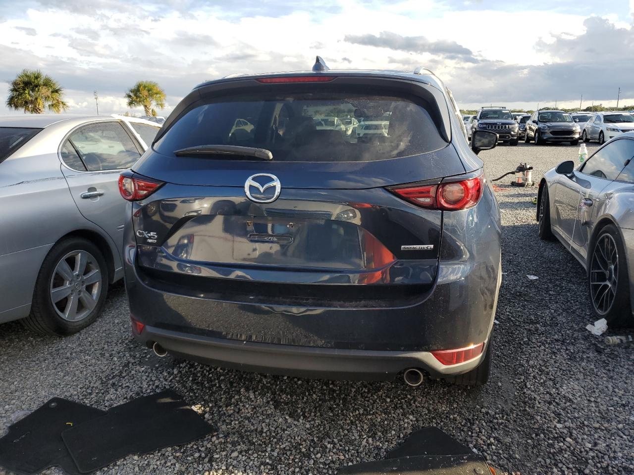 2021 Mazda Cx-5 Grand Touring VIN: JM3KFBDM1M0454674 Lot: 76001604