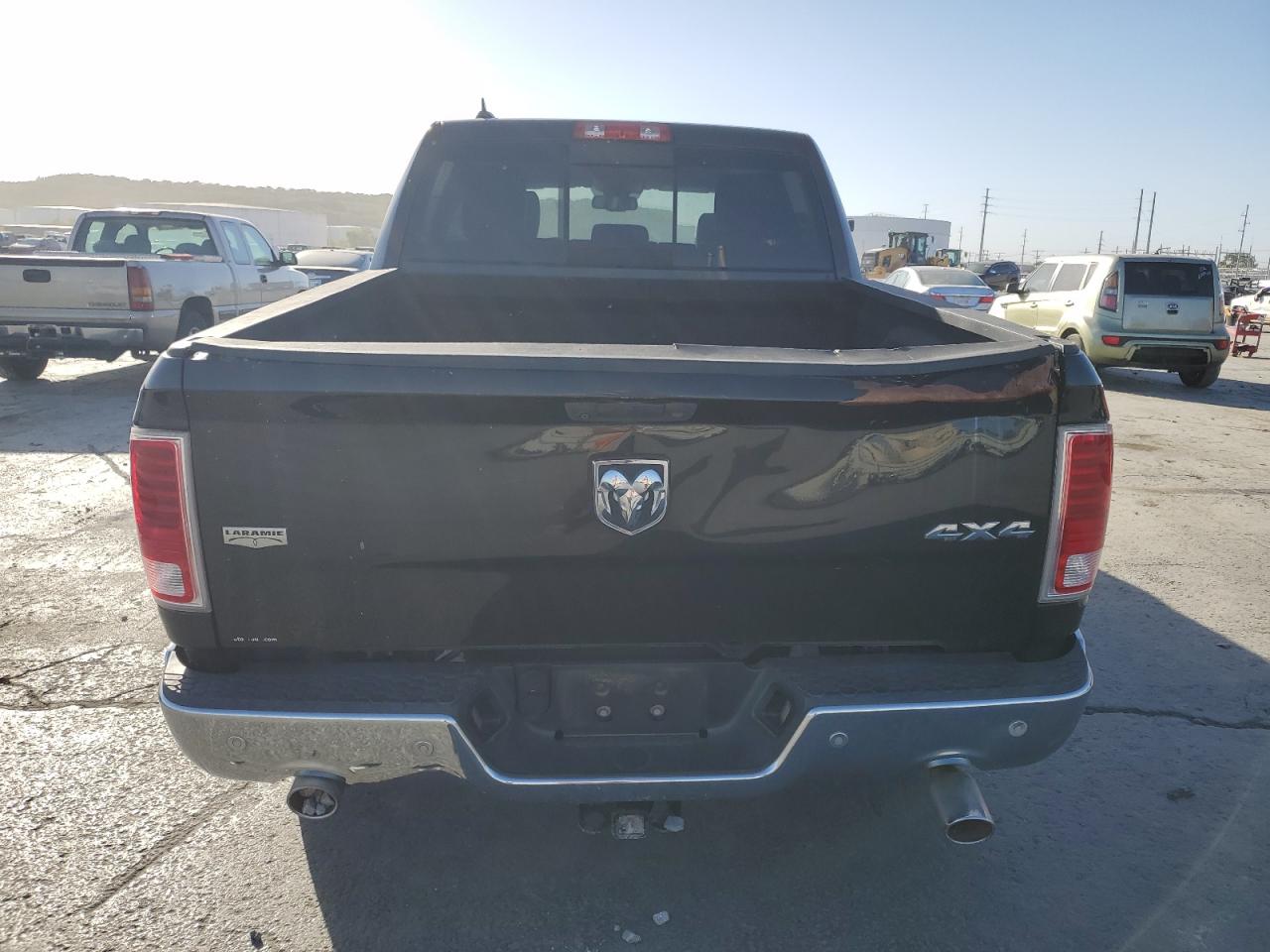 2015 Ram 1500 Laramie VIN: 1C6RR7NT9FS660518 Lot: 76101724