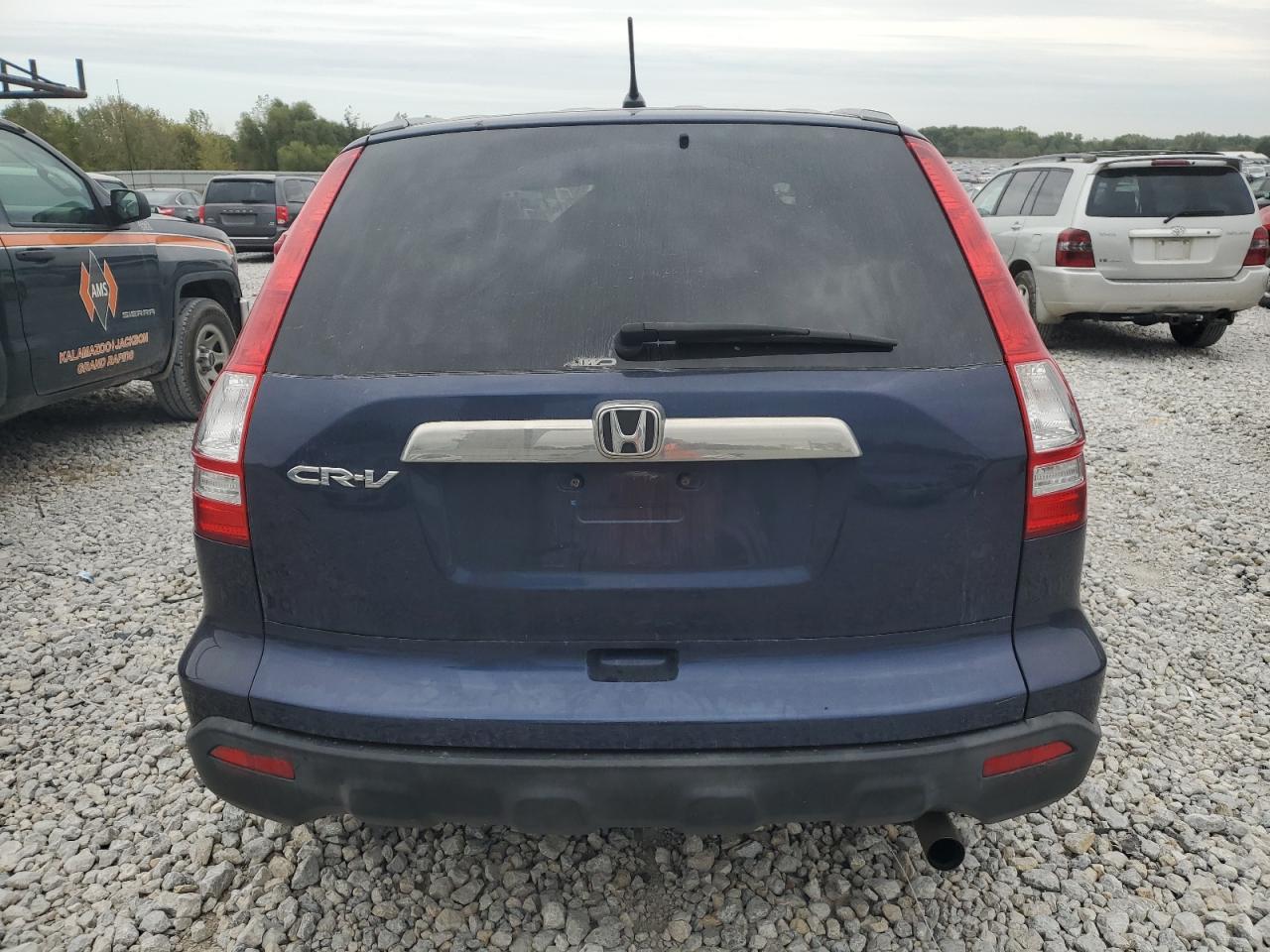 2009 Honda Cr-V Ex VIN: JHLRE485X9C003129 Lot: 74675534