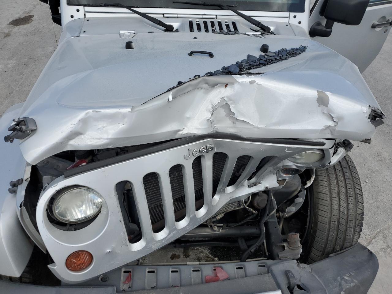 1C4HJWEG5CL100090 2012 Jeep Wrangler Unlimited Sahara