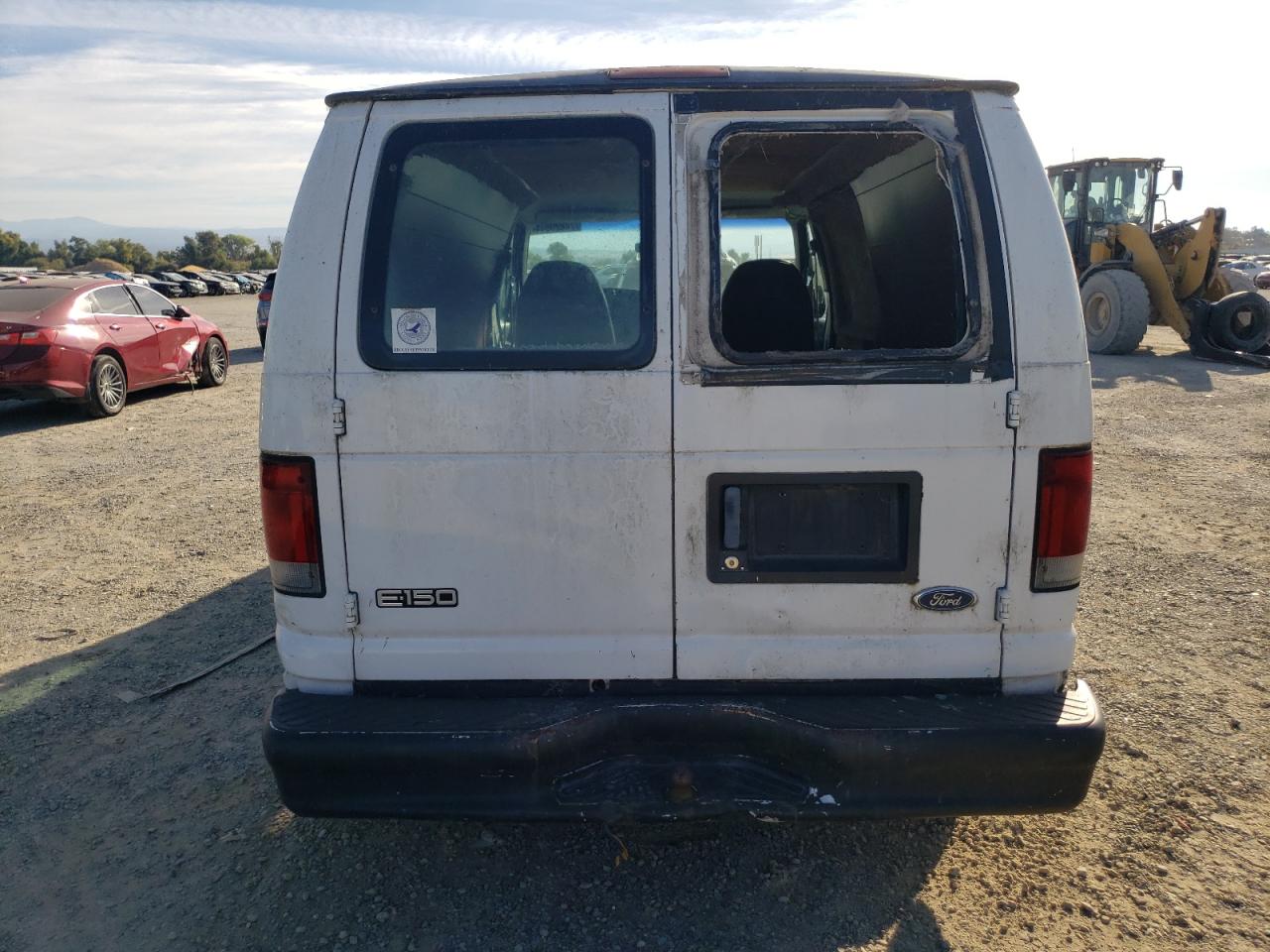 1999 Ford Econoline E150 Van VIN: 1FTRE1424XHB23967 Lot: 74820944