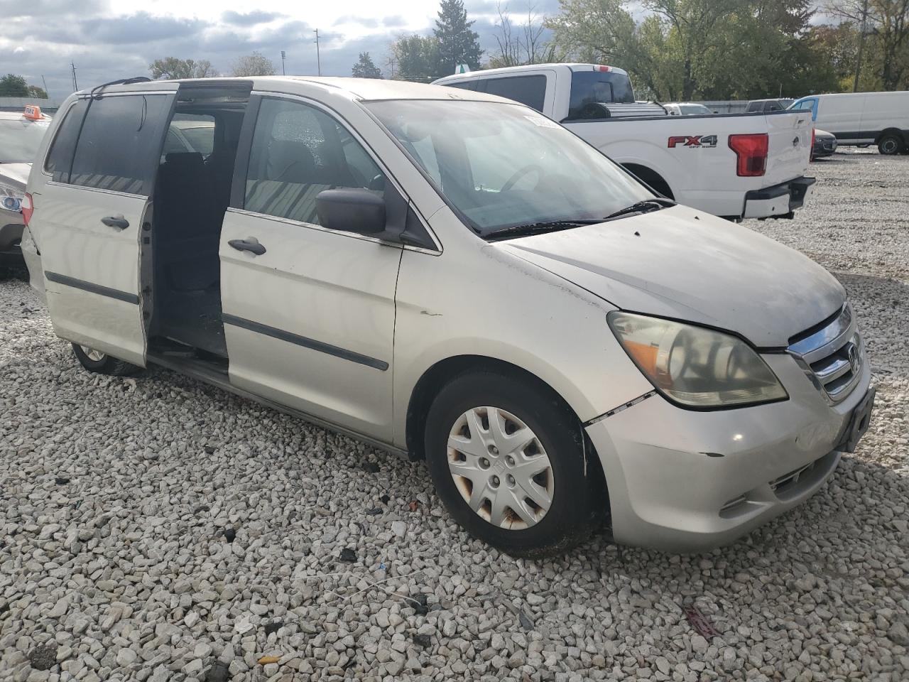 2005 Honda Odyssey Lx VIN: 5FNRL38235B044038 Lot: 75095254