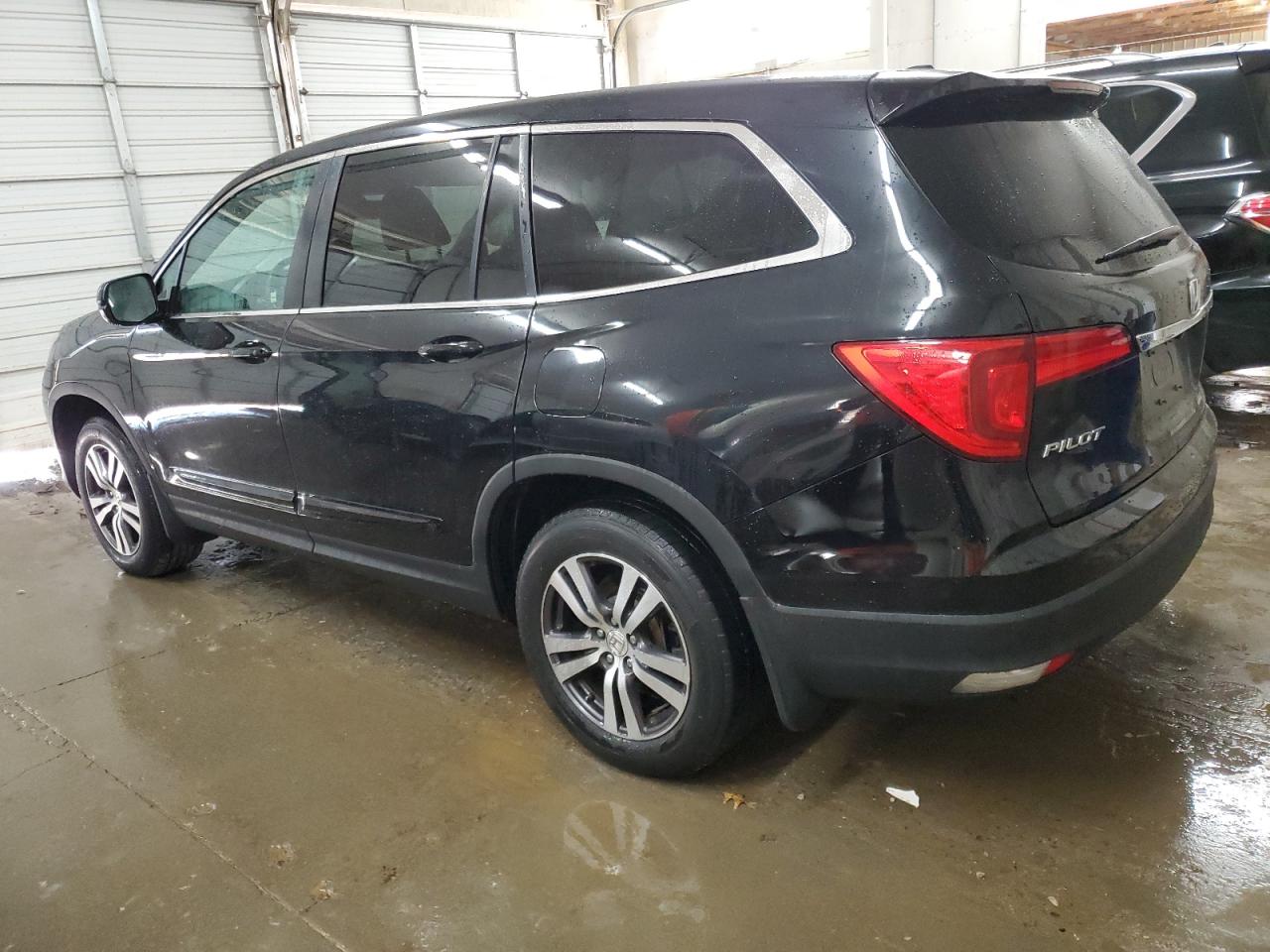 2016 Honda Pilot Exl VIN: 5FNYF5H55GB001090 Lot: 76774404