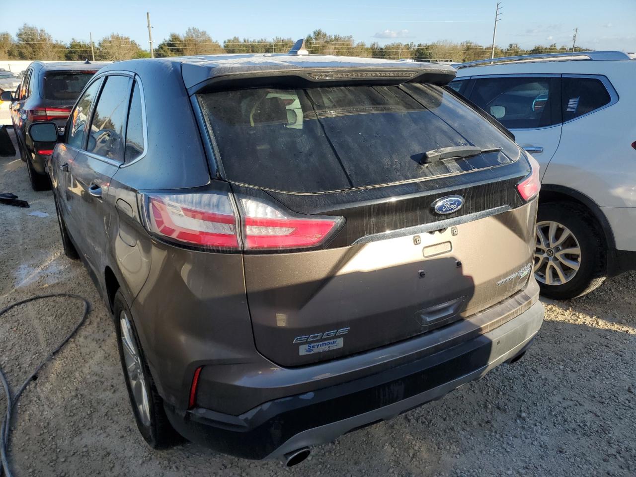 2019 Ford Edge Titanium VIN: 2FMPK4K9XKBC23607 Lot: 77440574