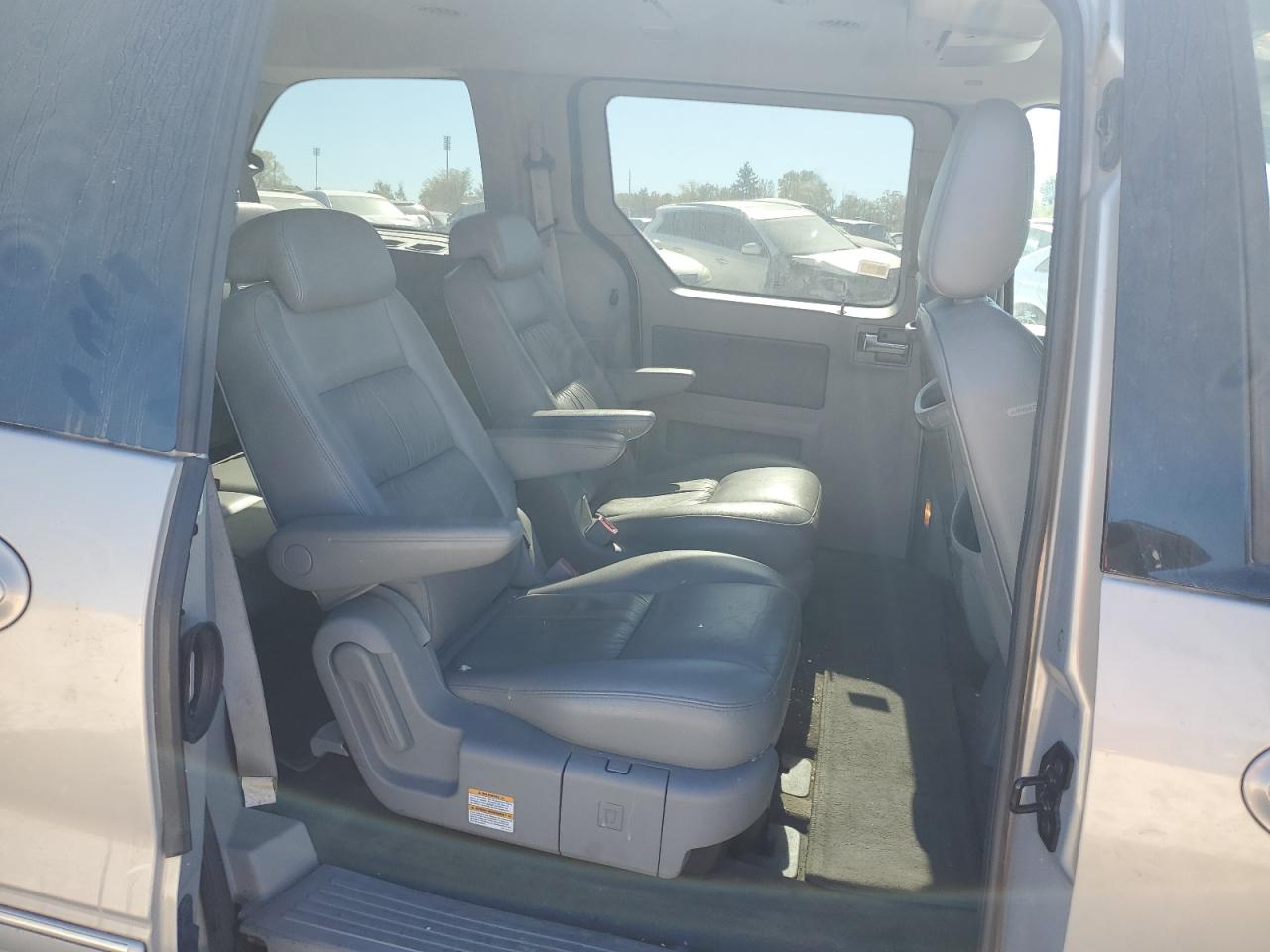 2006 Ford Freestar Limited VIN: 2FMDA58246BA09398 Lot: 75235144