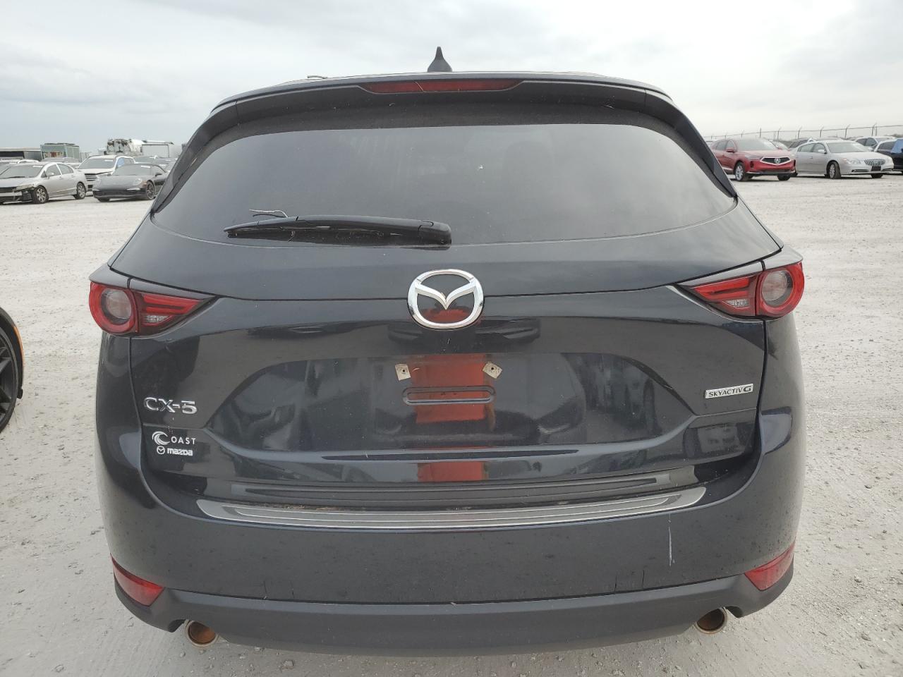 2021 Mazda Cx-5 Grand Touring VIN: JM3KFADM7M0482778 Lot: 74597044